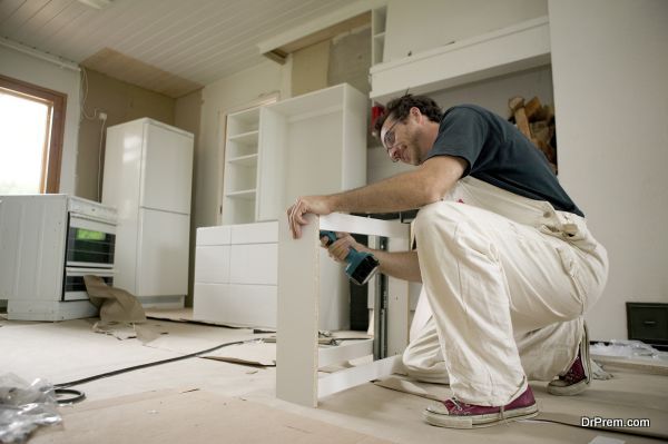 Assembling kitchen units.