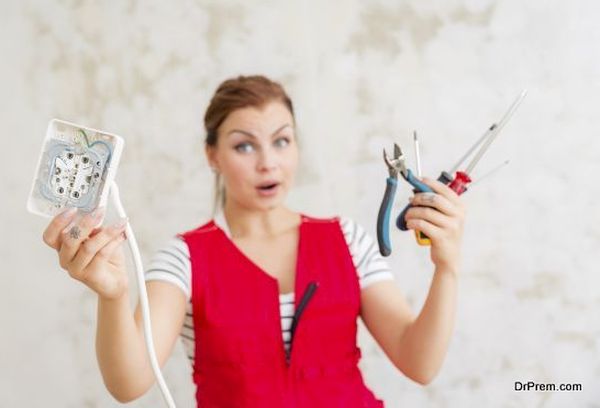 Woman wondering electric wiring