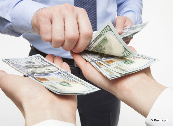 Human hands exchanging money