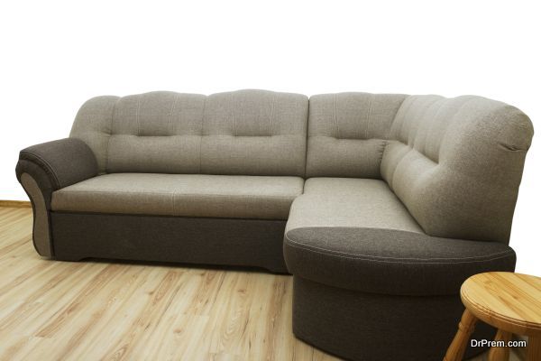 Soft sofa with stool in a flat.