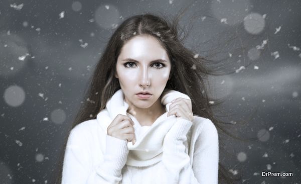 Winter Portrait of Woman in White Cashmere Sweater